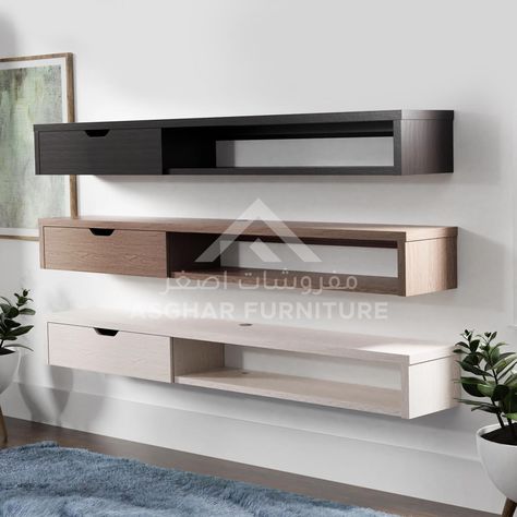 A slim addition to fit any living space, this Floating Wall Media Console entertainment unit features a wall-mounted design. A single drawer provides privacy while the open shelf makes it easy to place electronics, especially with the built-in cord management hole on top. Floating Shelf Under Tv, Centro Tv, Shelf Under Tv, Floating Media Console, Under Tv, Modern Tv Cabinet, Tv Wall Design, Cord Management, Floating Wall