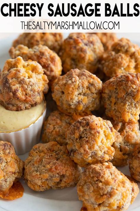 Sausage Balls are the perfect holiday and game day appetizer!  This recipe is made from scratch, full of juicy sausage, cream cheese, and cheddar with a simple maple dijon dipping sauce! Easy Sausage Balls Without Bisquick, Sausage And Cheese Balls, Sausage Balls Without Bisquick, Easy Sausage Balls, Easy Sausage Balls Recipes, Dip Cookies, Sausage Balls Bisquick, Sausage Cheese Balls, Cheese Balls Recipe