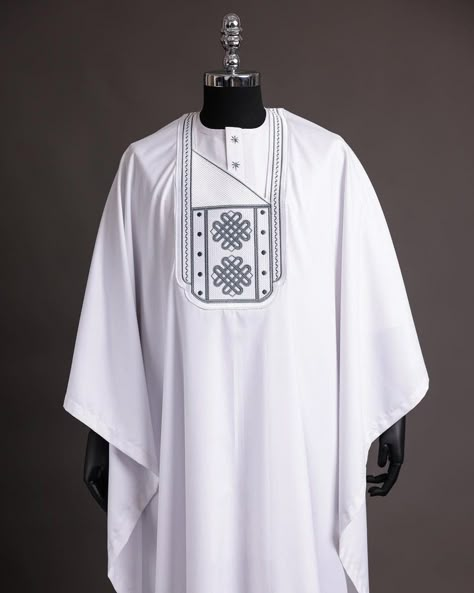 A white agbada, grey embroidery detailing, 3/4 sleeve buba & sokoto - Afrikrea White Agbada Styles Men, Latest Agbada Styles Men, White Agbada Designs, Traditional Mens Wear, Engagement Outfits For Men, Latest Agbada Designs, Agbada Styles Men, Agbada Designs For Men, White Agbada