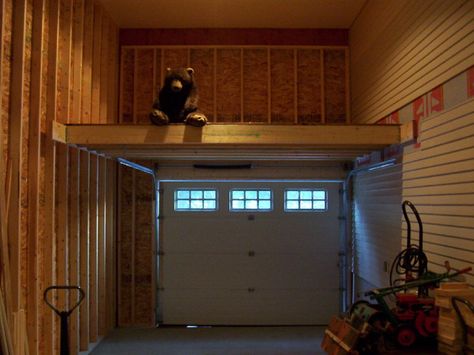 Over door mezzanine Garage Mezzanine Storage, Small Garage Interior, Mezzanine Storage Ideas, Garage With Mezzanine, Garage Mezzanine Ideas, Garage Built Ins, Garage Loft Storage, Mezzanine Garage, Garage Mezzanine