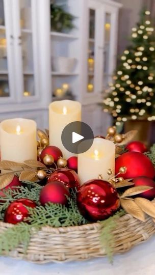 7.5K views · 245 reactions | Elegant Holiday Candle Garden❤️is a simple and stunning holiday centerpiece that combines a few iconic Christmas components setting up your holiday home in style! ✨https://ltk.app.link/CTKtJqOWWOb To style this centerpiece, I started with a faux cedar garland as a lush base for my trio of candles. I then layered in vibrant red ornaments of various sizes and finishes to add a dramatic Christmas flair. Finally, I softened the arrangement with gold accents, incorporating berry and bay leaf picks for that perfect finishing touch.Whether you have a large dining table or a cozy nook, this arrangement can be tailored to fit your space beautifully. #christmascenterpiece #christmasdiy #holidaydecor #holidaydiy #flamelessdecor | Janine Graff Faux Cedar Garland, Janine Graff, Candle Garden, Cedar Garland, Iconic Christmas, Christmas Styling, Holiday Candle, Xmas Deco, Large Dining Table