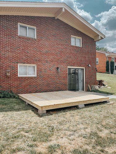 Wood Deck Designs, Small Patio Ideas On A Budget, Ground Level Deck, Building A Floating Deck, Platform Deck, Build A Deck, Deck Fence, Fence Gates, Digging Holes