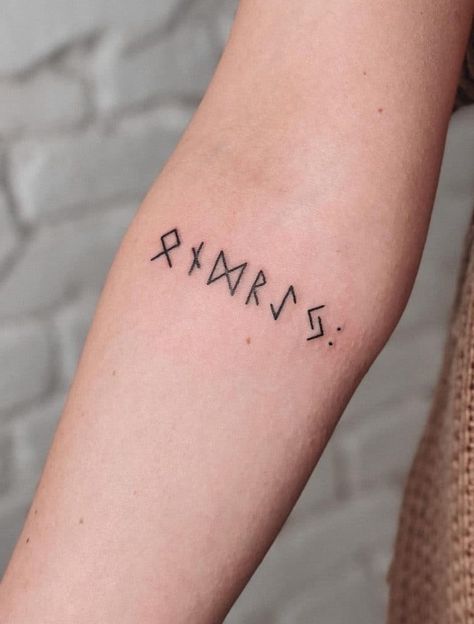 Runes Tattoo: A Delicate & Unique Symbol Of The Individual Rune Tattoos, Runes Tattoo, Yggdrasil Tattoo, Viking Rune Tattoo, Wrist Tattoos Words, Celtic Runes, Viking Tattoo Symbol, Rune Viking, Tattoos And Meanings