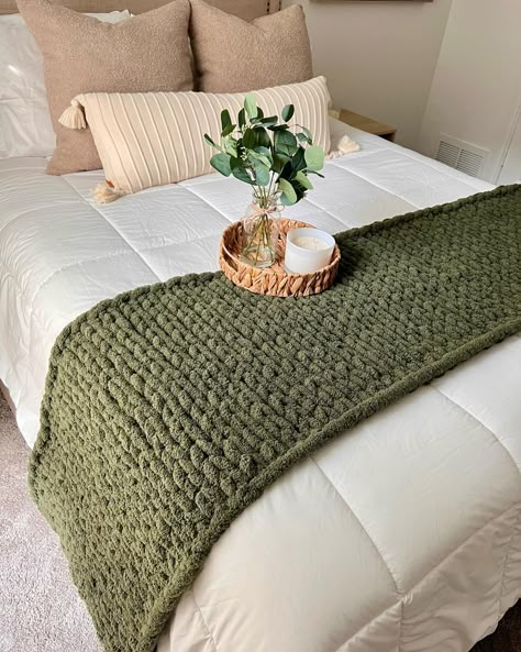 How stunning would it be to pair this bed runner with a set of chunky knit olive pillows? 😍 Knitted Bed Throw, Knitted Bed Runner, Knit Blanket Aesthetic, Knit Bed Runner, Finger Crochet Blanket, Finger Knitting For Beginners, Chunky Chenille Blanket, Knit Bed, Chunky Knit Blanket Pattern