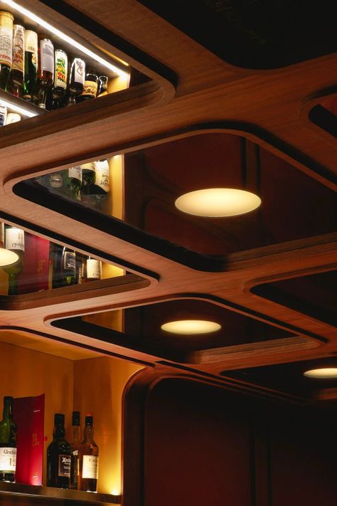 Celling Design Restaurant, Celing Roof Design For Restaurant, Mid Century Ceiling Design, Restaurant Ceiling Lighting, Midcentury Modern Restaurant Design, Low Ceiling Bar Design, Bronze Interior Design, Speakeasy Ceiling, Back Bar Ideas