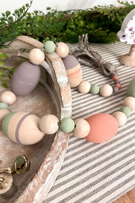 Wooden Eggs Crafts, Colorful Fireplace, Easter Garland Diy, Hobby Lobby Bedroom, Diy Door Wreaths, Plywood Cutouts, Wooden Bead Crafts, Easter Decor Crafts, Egg Garland