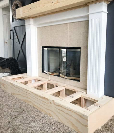 Is your fireplace dated and in need of a refresh? Check out this fireplace makeover. The before and afters are amazing!! Homemade Fireplace, Hearth Pad, Fireplace Redo, Diy Fireplace Makeover, Fireplace Update, Build A Fireplace, Brick Fireplace Makeover, Farmhouse Fireplace, Young House Love