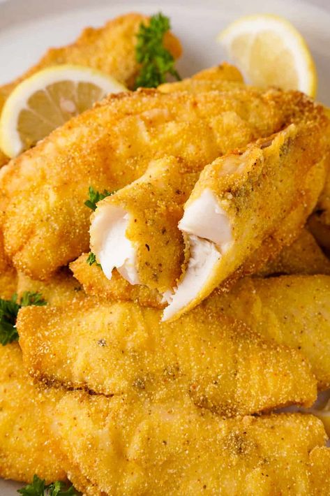 Crispy Southern fried catfish is an easy recipe ready in less than 30 minutes. This tender fish is perfectly seasoned and coated in a tasty cornmeal and flour coating that fries up in a flash. Catfish Seasoning Recipe, Fish Fry Seasoning, Catfish Dinner, Southern Meals, Fried Catfish Recipes, Fish Fries, Southern Fried Catfish, Fish Batter Recipe, Walleye Fish Recipes