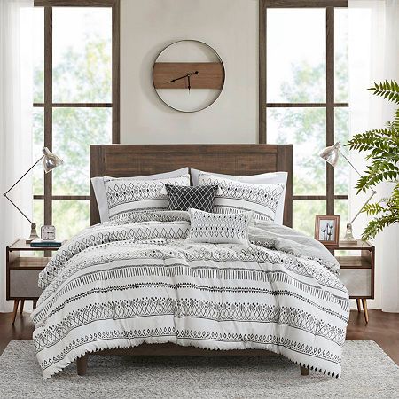 A diamond print in soft blue and taupe colors adorns the light beige face, while a taupe diamond print on the reverse adds a complementary farmhouse look. This set includes a comforter, 2 shams, and 2 decorative pillows with tassels or fringe to tie back into the bedding.Set includes 1 comforter, 2 matching shams and 2 throw pillowsPrinted soft microfiber seersucker face, printed microfiber reverse; 100% polyester fillingSouthwest style geometric diamond print in soft blue and taupe colors on comforter with taupe connected diamond print on the reverse sideMachine washable in large capacity commercial washer/dryerItems may come in compressed packaging to ensure efficient shippingItems will need to be fluffed up and steam ironed if compressedHypoallergenic polyester filling in the comforter Throw Pillows Blue, Comforter Sets Boho, Linen Comforter, Boho Comforters, Pillows Blue, Grey Comforter, How To Clean Pillows, Queen Size Comforter, Queen Bedding