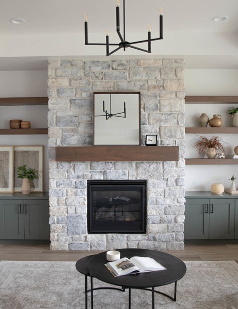 Full height stone fireplace clad in Eldorado Limestone Grand Banks stone Mortar is Off-White Full height stone fireplace clad in Eldorado Limestone Grand Banks stone Mortar is Off-White #stonefireplace #stone #fireplace #Limestonefireplace #mortar Light Colored Stone Fireplace, Fireplace Grey Stone, Eldorado Stone Fireplace, Diy Limestone Fireplace, White Stone Fireplace, White Stone Fireplaces, Reno House, Stone Mortar, Eldorado Stone