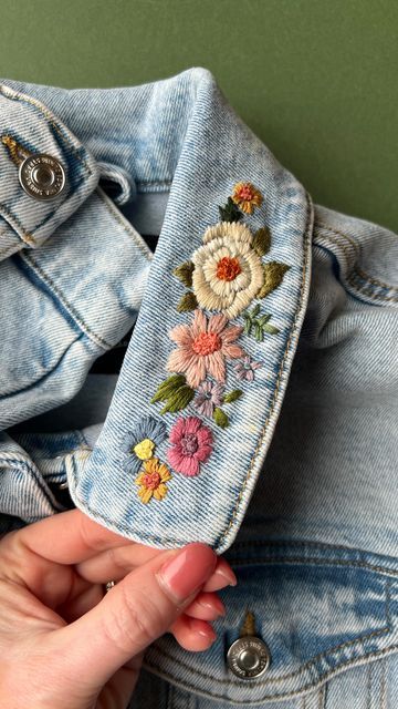 Jenny ~ Embroidery Hoop Art on Instagram: "Stick and Sew🪡🧵 I’ve created some new designs, that are perfect for denim. Check out my web shop to see the whole range of designs ready for you to stitch. . . #handmadestyle #embroideryinstaguild #dmcembroidery #sewing #embroideryart #embroideryhoop #embroidered #embroideryartist #embroideryartwork #madeintheuk #supportsmallbusiness #britishstitchers #embroiderywork #upcycledfashion #hoopartembroidery #handmadewithlove #embroideryhoopart #embroidelicious #florals #modernembroidery #contemporaryembroidery #bordado #broderiemoderne #broderiemain #embroidery #handmadeembroidery #createdtocreate #handmadeisbetter #craftsposure #sewinginspiration" Jean Embroidery Flowers, Flower Embroidery Jean Jacket, Blue Jean Embroidery, Embroidery On Denim Shirt, Jeans Jacket Embroidery Ideas, Embrodery Jeans, Embroidery Designs On Clothes, Embroidery Jean Jacket, Jean Jacket Embroidery