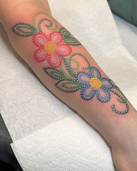 Poppy Del on Instagram: "Based on family beading from her baby belt. I love taking family traditional beading and adding my spin to it.  Thanks to all my wonderful clients who travel from all over to see little ol me. ❤️❤️❤️ #babybelt #familybeadwork #beadedtattoo #edmotontattoo" Beaded Tattoo Designs, Bead Tattoo, Flower Tattoo, Bead Work, Tatting, Poppies, Wonder, Tattoos, Beads