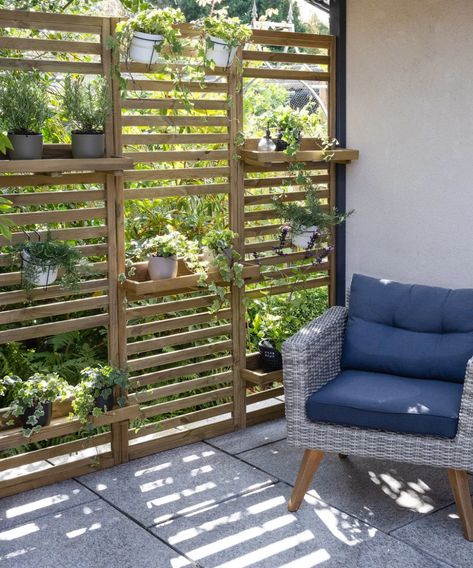 Balcony privacy ideas: 9 ways to screen it from view | Garden Wall Planter, Outdoor Garden Storage, Taman Air, Garden Privacy Screen, Balcony Privacy, Privacy Wall, Patio Privacy, Vertical Garden Wall, Garden Privacy