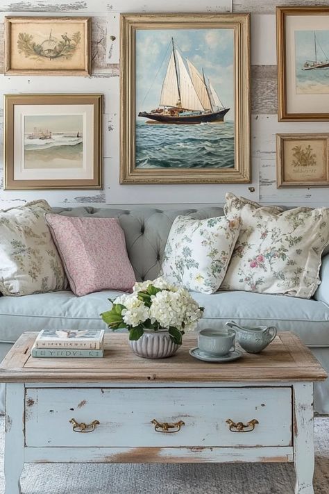 A pleasing combination of coastal vintage decor featuring weathered wood tones and soft blue accents. Ideal for creating a calming, beach-inspired atmosphere at home. Rustic Beach House Decor Coastal Style, Coastal Antique Decor, French Country Coastal Decorating, Vintage Ocean Aesthetic, Coastal Grandma House, Vintage Coastal Aesthetic, Beach Cottage Aesthetic, Gallery Wall Decor Ideas, French Beach House