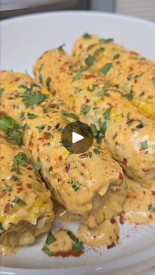 1.1M views · 8.6K reactions | Creamy Cajun Corn - you will be addicted to this 😃 This is a highly requested video !!!  4 CORN ON THE COB WHOLE / PIECES 2 TBSP UNSALTED BUTTER 1 TBSP... | By Trini cooking with Natasha | Creamy Cajun Corn. You all have been requesting this. It's all over my for you page on TikTok. So here's how I'll make it. I'm going to go ahead and steam the corn without any salt for 15 minutes. Once it's finished in a separate pan, add unsalted butter and then go in with freshly minced garlic. Let that saute for a minute and then add in pimento flakes. If you don't have pimento flakes, you can use crushed chili and go in with heavy whipping cream or cooking cream. Cajun season and the paprika or smoked paprika. Give that a mix and add in your Parmesan and your pecorino R Creamy Cajun Garlic Corn, Cajun Creamy Garlic Corn, Cajun Corn On The Cob, Crazy Corn, Cajun Corn, Easy Cajun, Cajun Butter, Italian Parsley, Buttered Corn