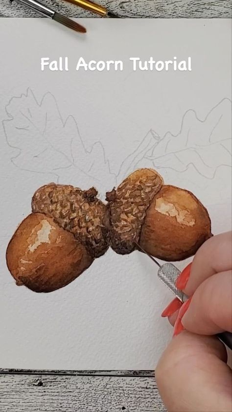 Learn how to paint some 3-D looking acorns with me! I am applying some easy techniques, mostly how to build shadows and color to create that 3-D effect, but I have a new technique to share with you close to the end which can add even more detail. Watch to the end and let me know what you think, and if this tutorial was helpful 😊 Colors I used: cadmium yellow orange, burnt sienna, moonglow, olive green, raw sienna #acorn #fallart #autumn #autumnvibes #watercolors #watercolorart #illustration #i Acorn Painting Canvas, Acorn Watercolor Paintings, Watercolor Fall Paintings, Thanksgiving Painting Ideas, Painting On Brown Paper, Autumn Painting Ideas Easy, Paint Acorns, Acorn Watercolor, Fall Watercolor Paintings