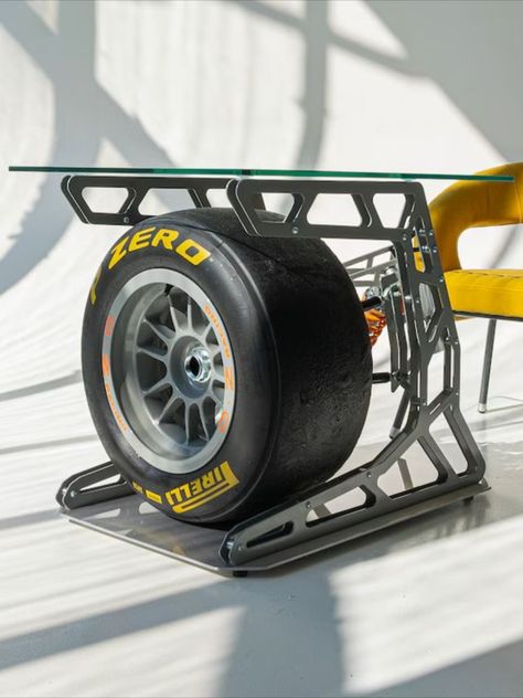 Formula One Car Wheel Turned into a Chic Coffee Table Tire Table, Wheel Table, Cardboard Chair, Formula One Car, Office Graphics, Old Car Parts, Beds Storage, Automotive Furniture, Chic Coffee Table