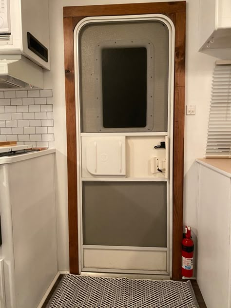 Rv Door Frame Makeover, Trim Around Camper Door, Painting Rv Window Frames, Rv Door Trim, Camper Window Trim, Rv Door Makeover, Camper Door Makeover, Rv Renovation Ideas, Rv Living Ideas