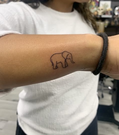 India Inspired Tattoos For Women, Elephant Tattoos Dainty, Blue Elephant Tattoo, Elephant Tattoos On Wrist, Small Simple Elephant Tattoo, Simplistic Elephant Tattoo, Simple Line Elephant Tattoo, Elephant Wrist Tattoos For Women, Elephant Memorial Tattoo Grandma