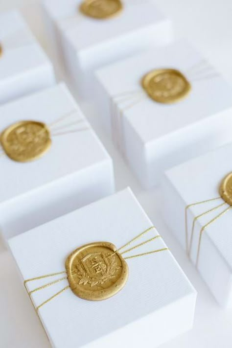 Image 50 of White & Gold Wedding In Athens Riviera Wax Seal Favor Boxes, White And Gold Wedding Favors, Wedding Boxes Ideas, White And Gold Packaging, Gold Packaging Design, White Gold Packaging, Wedding Favors Boxes, Gold Favor Boxes, Favor Boxes Wedding