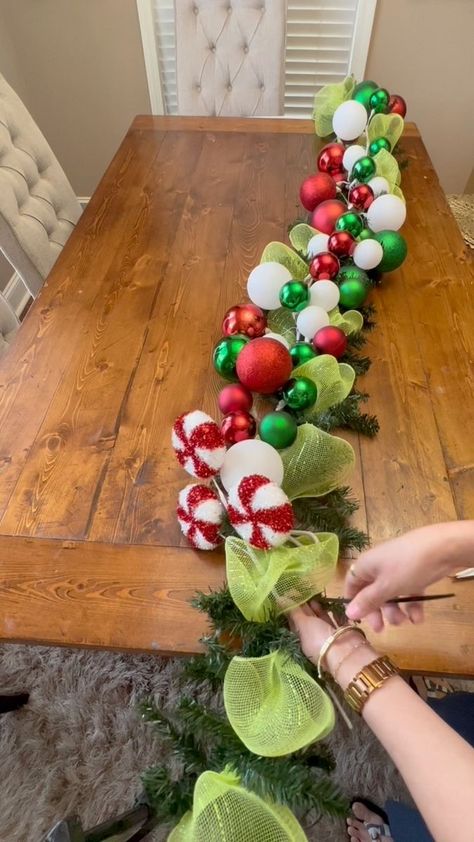 Grinch Stair Garland, Whoville Christmas Garland, How To Make Whoville Houses, Diy Grinch Christmas Garland, The Grinch Decor Ideas, The Grinch Garland, Grinch Fireplace Decorating Ideas, Grinch Dining Room, Grinch Themed Decorations