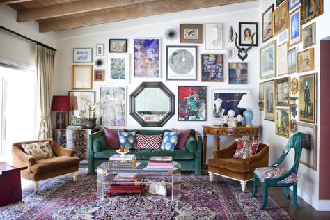 Colorful art and accents fill the great room, where the original ceiling was left intact and unfinished | archdigest.com Living Room Decor Artwork, Color Apartment, Ranch Living Room, Brentwood Los Angeles, Maximalist Room, Weekend Photography, Pet Wall Art, Peter Dunham, Colourful Decor