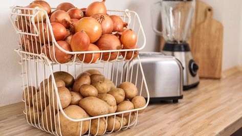 Potatoes are a hardy vegetable that you can stock up on and store for a long time, but you’ll need the best potato storage bin to keep them fresh. Onion Potatoes Storage, Potato And Onion Storage, Potato Onion Storage, Storing Potatoes, Onion And Potato Storage, Where To Store Potatoes In Kitchen, Pantry Vegetable Storage, Storing Potatoes And Onions, Best Way To Store Potatoes