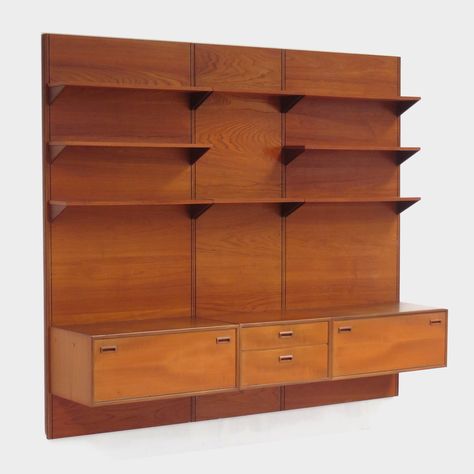 Listed on VNTG.com: Mid century wall unit with hanging sideboard & bookshelves made of teak, 1960s | #vntg #vintage Floating Sideboard, Mcm Modular Wall Unit, Mid Century Display Hanging Cabinet, Mid Century Wall Unit, Teak Modular Wall Unit, Mid Century Modular Wall Shelves, Midcentury Sliding Door Cabinet, Teak Wall, Free Standing Wall