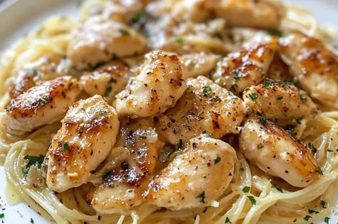 Indulge in a taste of Italy with this Chicken Scampi, featuring tender chicken cooked to perfection and served over a bed of angel hair pasta. The dish is bathed in a flavorful garlic-lemon butter sauce with hints of dry white wine, making each bite refreshing yet comforting. It’s the perfect recipe to elevate your everyday dinners or impress guests with its vibrant flavors and elegant presentation. Ready in just 30 minutes, this chicken scampi recipe is all about simplicity and great taste. ... Chicken Scampi Pasta Natashas Kitchen, Grilled Chicken Scampi, Angel Hair Pasta Recipes Chicken, Creamy Chicken Scampi, Chicken Scampi Pasta, Chicken Francaise Recipe, Chicken Scampi Recipe, Chicken Linguine, Angel Hair Pasta Recipes