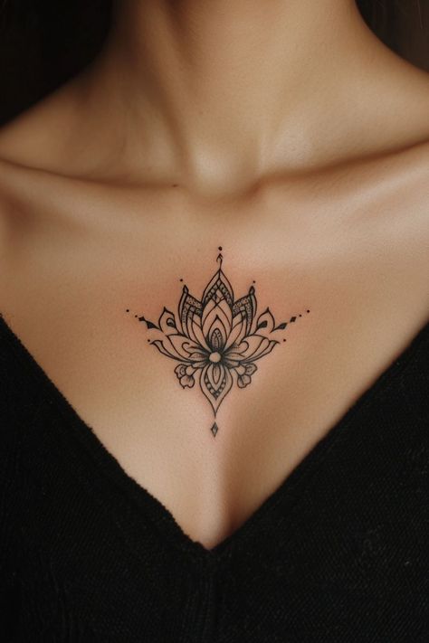 Mesmerizing Female Chest Tattoo Designs 🔥 Check more at https://ideatatto.com/female/mesmerizing-female-chest-tattoo-designs-%f0%9f%94%a5/ Lotus Chest Tattoo For Women, Anahata Tattoo, Minimalist Chest Tattoo, Feminine Chest Tattoo For Women, Cute Chest Tattoo Female, Chest Tattoo Ideas For Women, Center Chest Tattoo Female, Female Chest Tattoo Ideas, Tattoo Ideas Female Chest