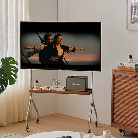 Weird Tv Placement, Tall Narrow Tv Stand, Open Concept Tv Placement, Tv Stand Roll, Tv Adjustable Wall Mount, Chrome Tv Stand, Tv Stand Mount, Tv Rolling Stand, Movable Tv Stand Ideas