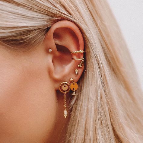 1,520 Likes, 8 Comments - Luv Aj (@luvaj) on Instagram: “all I want for Christmas is more ear piercings for my growing collection of earrings ✨ tap to shop!” Tragus Tattoo, Piercing Surface, Piercing Anti Tragus, Spiderbite Piercings, Tragus Piercing Earrings, Piercing Face, Ear Peircings, Ear Piercings Tragus, Tragus Hoop