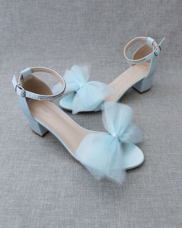 Shop our selection of satin & glitter shoes for flower girls, birthday parties and costume parties. Navy Blue Shoes for girls in flats, mary jane and heels. FREE US SHIPPING FOR ORDERS $100 AND MORE! Prom Sandals With Bow And Block Heel, Block Heel Sandals With Bow For Prom, Spring Formal Tulle Heels, Summer Wedding Tulle Heels, Spring Wedding Heels With Tulle Material, Ankle Strap Tulle Heels For Parties, Tulle Ankle Strap Heels For Party, Spring Party Heels With Tulle Material, Spring Party Tulle Heels