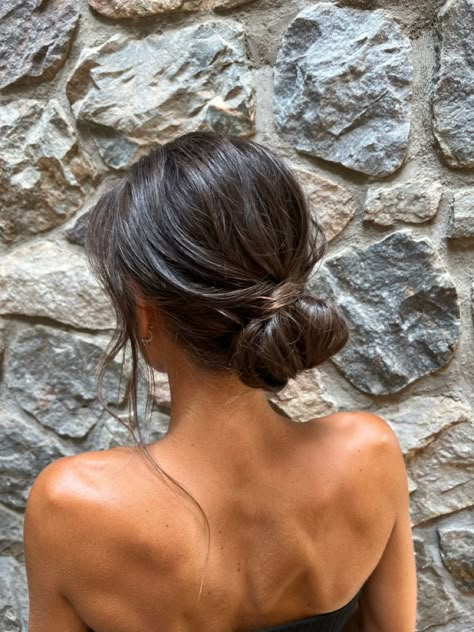 Hoco Hair Ideas Low Bun, Prom Simple Updos, Minimalist Bridesmaid Hair, Simple Bun Hairstyles Wedding, Low Bun With Loose Curls, Dark Hair Low Bun, Simple Wedding Hair Bun, Minimal Bridesmaid Hair, Low Messy Bun Brown Hair