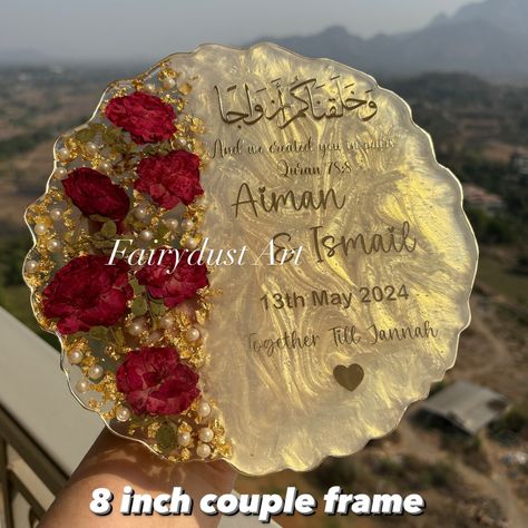 Couple frames are a trendy and aesthetic gift to decorate the room . Dm to order yours @fairydustart_16 . [ couple gift, couple gifts, anniversary gift, anniversary gifts, wedding gift, wedding gifts, anniversary gift] Resin Frames For Couples, Resin Works, Decorate The Room, Anniversary Frame, Aesthetic Gift, Marriage Anniversary, Art Frames, Gifts Anniversary, Diy Resin Crafts