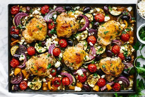 Greek Sheet Pan Chicken Dinner - Downshiftology Greek Sheet Pan Chicken, Greek Sheet Pan, Greek Dinner, Crispy Baked Chicken Thighs, Sheet Pan Meals Chicken, Chicken Tray Bake, Greek Dinners, Mediterranean Diet Recipes Dinners, Dinner Aesthetic