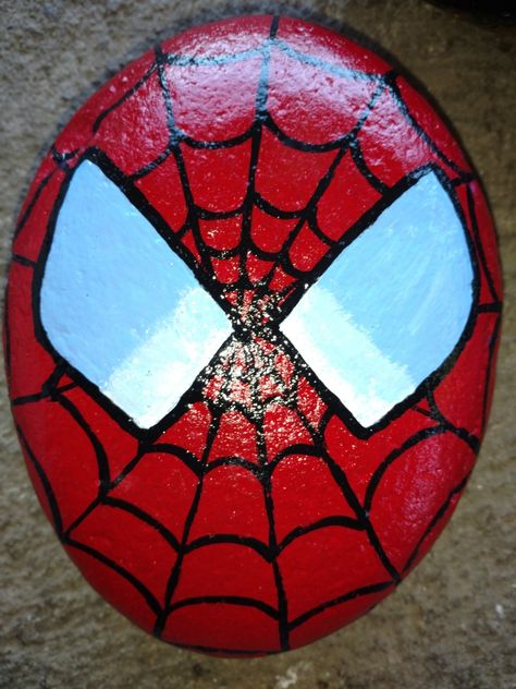 Spiderman rock painting Rock Spiderman, Rock Painting Spiderman, Tmnt Rock Painting, Spiderman Rock Painting Ideas, Superhero Rock Painting Ideas, Rock Painting Spider, Superman Rock Painting, Painted Rocks Spiderman, Line Art Projects