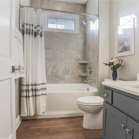 Bathroom Remodel Dark Wood Floor, Wood Floor Bathroom Ideas Modern, Grey Bathroom Cabinets With Wood Floors, Small Bathroom With Hardwood Floors, Small Bathroom Wood Tile Floor, Bathroom Flooring Color Ideas, Small Bathroom Brown Floor, Small Bathroom Remodel Dark Floor, Bathrooms With Dark Wood Floors