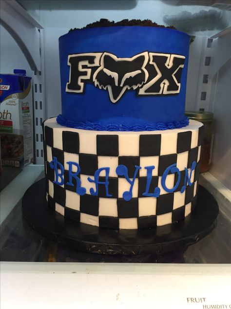 Dirt bike fox racing birthday cake Fox Racing Party Ideas, Fox Racing Birthday Party, Dirt Bike Birthday Party Food, Fox Racing Cake, Motorcross Birthday Party Kids, Dirt Bike Birthday Cakes For Boys, Motorbike Cake Dirt Bikes, Racing Cake, Fox Birthday Party