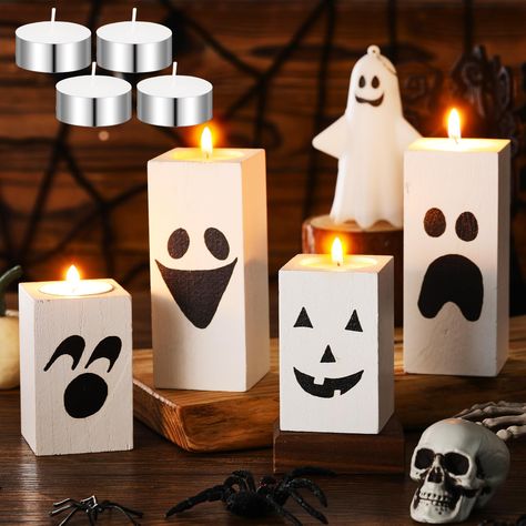 PRICES MAY VARY. Meet Your Needs: with every purchase, you don't just get the beautifully designed 4 Halloween tea light candle holders, but also 4 tea lights included in the package, each candle can burn for 8 hours,the comprehensive package makes it ready to use, enhancing your convenience, and you can share this set with your family or friends Halloween Design and Material: our Halloween tea light candle holders are constructed from quality wood, giving it durability and longevity, The outer Halloween Ghost Table Decorations, Halloween Birthday Centerpieces, Table Decor Halloween, Candles Halloween, Halloween Table Settings, Halloween Table Decor, Halloween Blocks, Halloween Party Treats, Minimalist Halloween