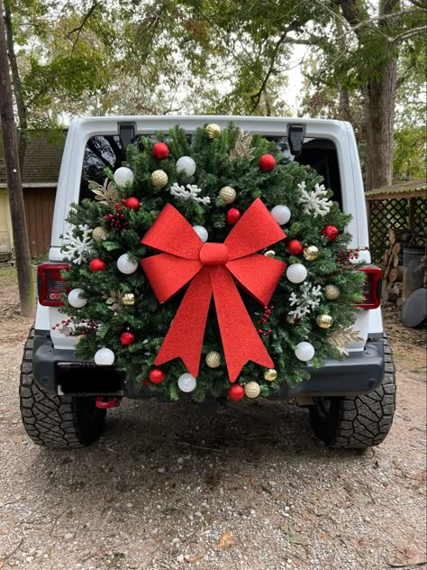 All hand mand, products from hobby lobby! Wrangler Christmas Decorations, Christmas Decorations For Jeep Wrangler, Jeep Wrangler Christmas Wreath, Jeep Christmas Wreath, Holiday Jeep Decorations, Jeep Spare Tire Halloween Decorations, Jeep Tire Decorations, Christmas Jeep Tire, Jeep Tire Christmas Decorations