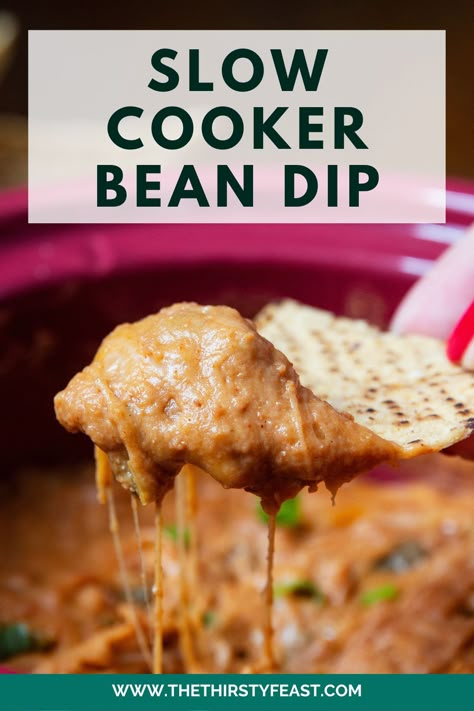 This slow cooker bean dip with cream cheese is the perfect game day party dip. Simple ingredients - cheese, green onions, and cream cheese are the base for this easy cheesy bean dip. Hot Bean Dip Crockpot, Crockpot Bean Dip Recipes, Bean And Cheese Dip Crockpot, Cheese Bean Dip Crock Pot, Slow Cooker Bean Dip Recipes, Slow Cooker Bean Dip, Instant Pot Bean Dip, Black Bean Cheese Dip, Cheese Bean Dip Recipes