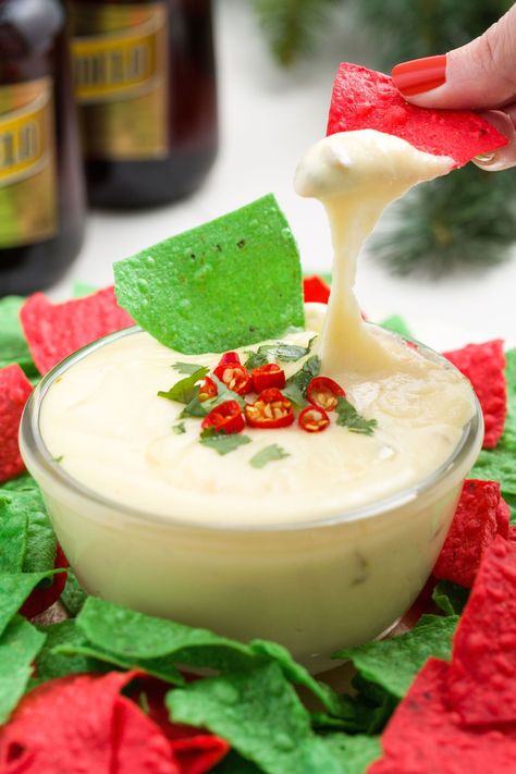 Our Christmas Queso Will Melt Your Heart  - Delish.com Christmas Queso, Creative Christmas Appetizers, Christmas Party Dips, Holiday Party Appetizers, Christmas Appetizers Easy, Party Dip Recipes, Christmas Cheese, Christmas Appetizers Party, Christmas Recipes Appetizers