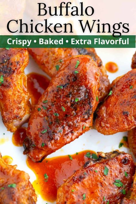 These Oven-Baked Buffalo Wings are tender and juicy on the inside, perfectly crispy on the outside, and covered in the best spicy buffalo sauce. Serve as an appetizer or finger food for pizza night, game night, or just for fun! Buffalo Wings In The Oven, Chicken Wing Sauces Easy, Oven Buffalo Wings, Buffalo Chicken Wings In The Oven, Oven Baked Buffalo Wings, Baked Buffalo Chicken Wings, Buffalo Wings Recipe Baked, Chicken Wings Crispy, Spicy Chicken Wings Recipe