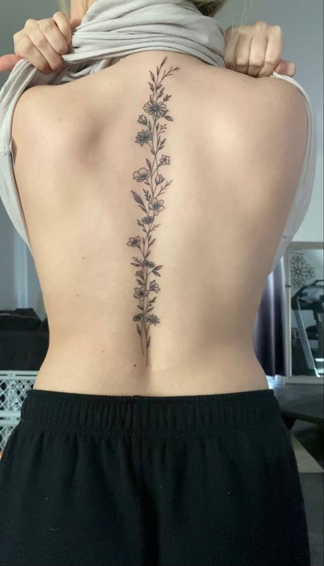 Cosmos Spine Tattoo, Spine Tattoos On Women, Curvy Spine Tattoo, March Flower Spine Tattoo, Southern Spine Tattoos, Spine Tattoos Sunflower, Floral Spine Tattoo With Quote, Spinal Tattoo Floral, Floral Tattoo Design Spine