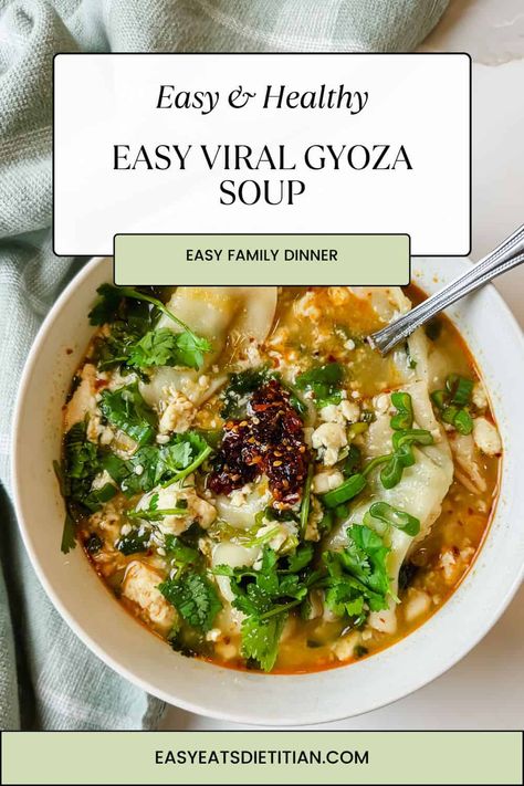 This is my high protein take on the viral gyoza or dumpling soup! It's easy, delicious and perfect for the cozy colder months! #easydinner #easysoup #viralsoup #dumplingsoup #cozydinner #falldinnerideas #fallrecipes #winterrecipes #cozyrecipe #viralrecipe Gyoza Dinner Ideas, Cabbage Dumpling Soup, Healthy Dumpling Soup, Trader Joes Gyoza Soup, Gyoza Ramen Soup, High Protein Dumplings, Frozen Gyoza Soup, Miso Dumpling Soup, Pork Dumpling Soup