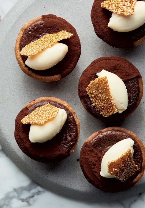 Yotam Ottolenghi’s Little Baked Chocolate Tarts with Tahini and Sesame Brittle (or marmalade) Sesame Brittle Recipe, Sesame Brittle, Chocolate Tarts Mini, Yotam Ottolenghi Recipes, Chocolate Tarts, Ottolenghi Recipes, Yotam Ottolenghi, Sweet Recipe, Mary Berry