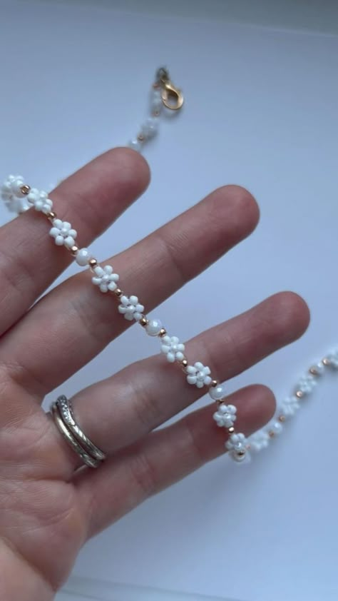 White Floral Necklace in 2022 | Beaded jewelry, Diy bracelet designs, Seed bead jewelry Beaded Jewelry Homemade, Jewelry Making Aesthetic Beads, Seed Bead Inspo Aesthetic, Unique Seed Bead Jewelry, Jewry Making Ideas, Dainty Diy Jewelry, Seed Bead Bracelet Ideas Aesthetic, Aesthetic Seed Bead Jewelry, Beeds Jewelery Ideas