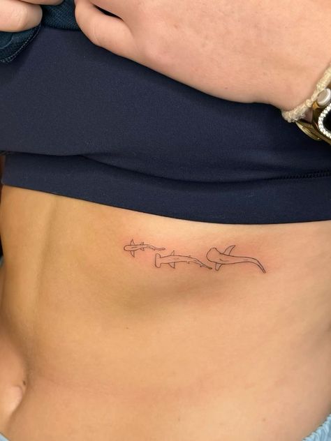 3 Sharks Tattoo, Dainty Shark Tattoo, Small Ocean Themed Tattoos, Shark Rib Tattoo, Tattoo Ideas Shark, Sea Creatures Tattoo, Shark Teeth Tattoo, Shark Tattoo Design, Tattoos Shark