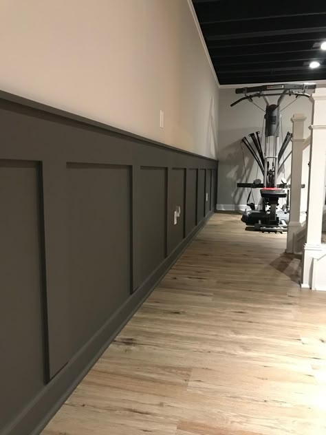 DIY Basement Ideas Dark Wainscoting Basement, Basement Two Tone Walls, Two Tone Basement Walls Paint Ideas, Half Wall Ledge Basement, Beadboard Half Wall Basement, Basement Wall Paneling Ideas, Downstairs Basement Ideas, Basement Dark Accent Wall, Accent Walls In Basement